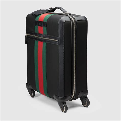 luggage gucci hombre.